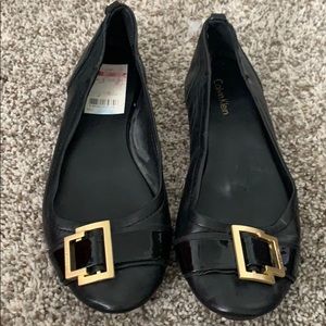 Black leather Calvin Klein ballet flats
